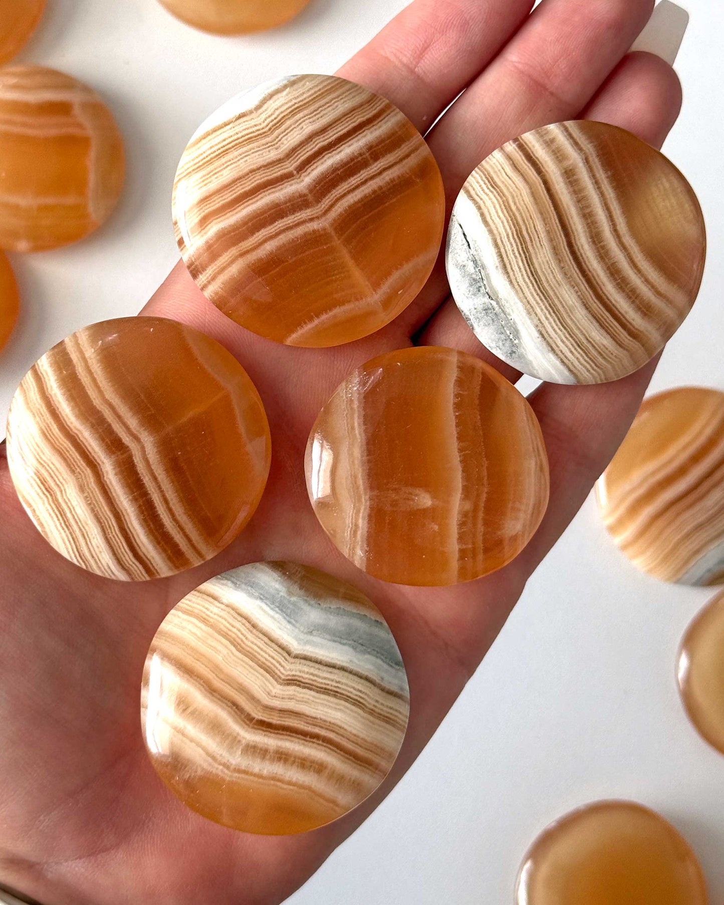 Banded Honey Calcite Round Palm Stone