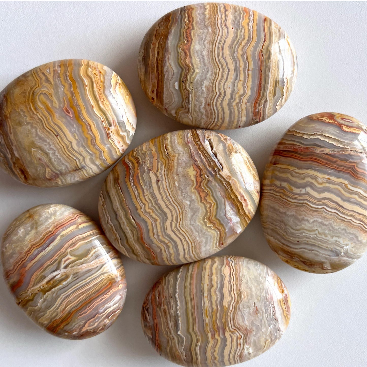 Crazy Lace Agate Palm Stone