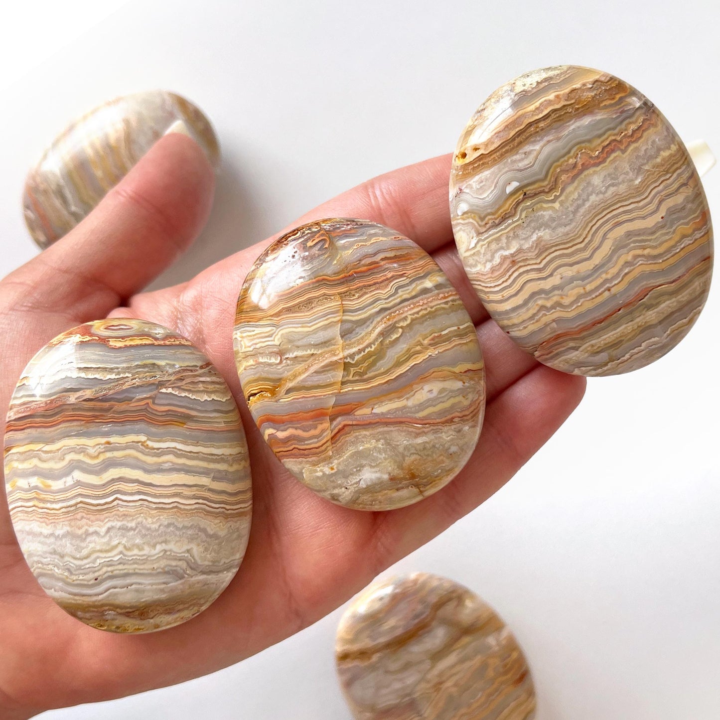 Crazy Lace Agate Palm Stone