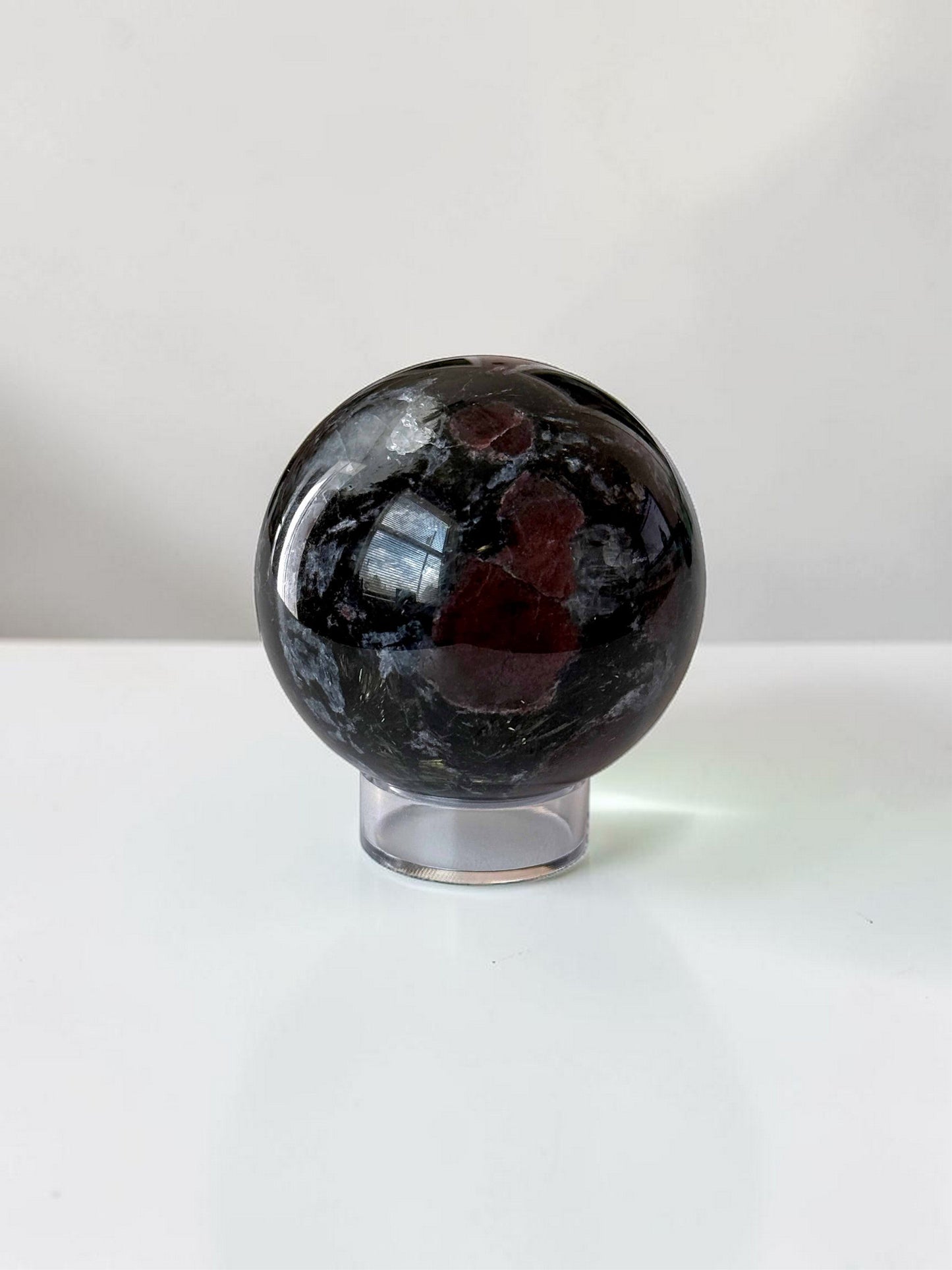 Garnet in Astrophyllite Spheres 60mm