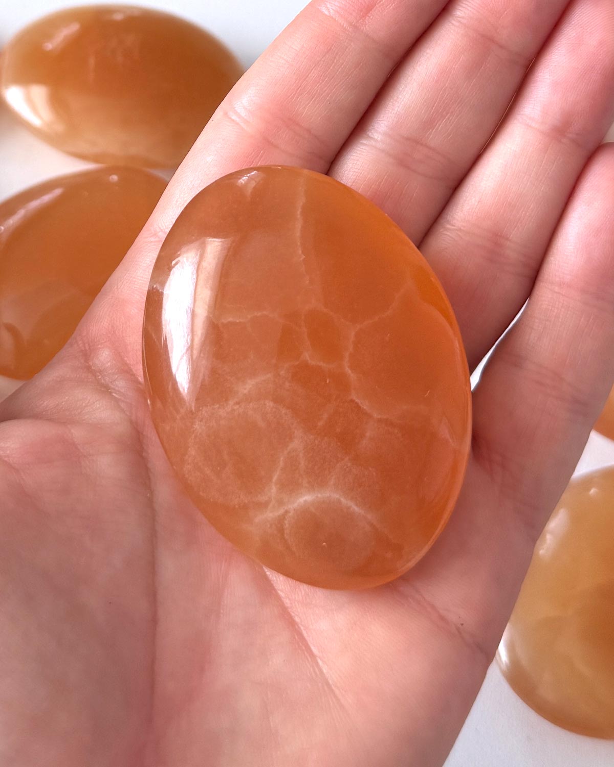 Honey Calcite Palm Stone