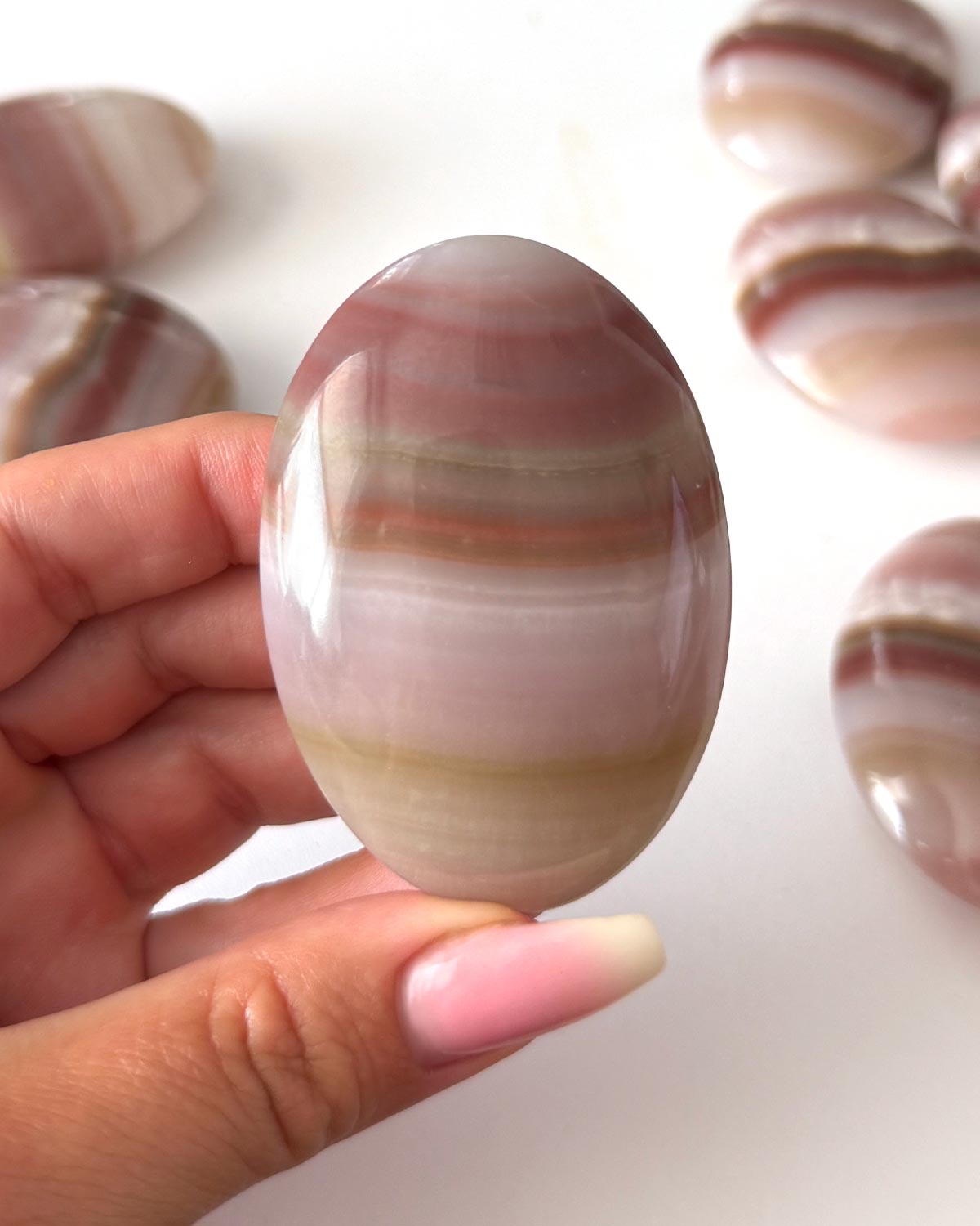 Pink Banded Onyx Palm Stone