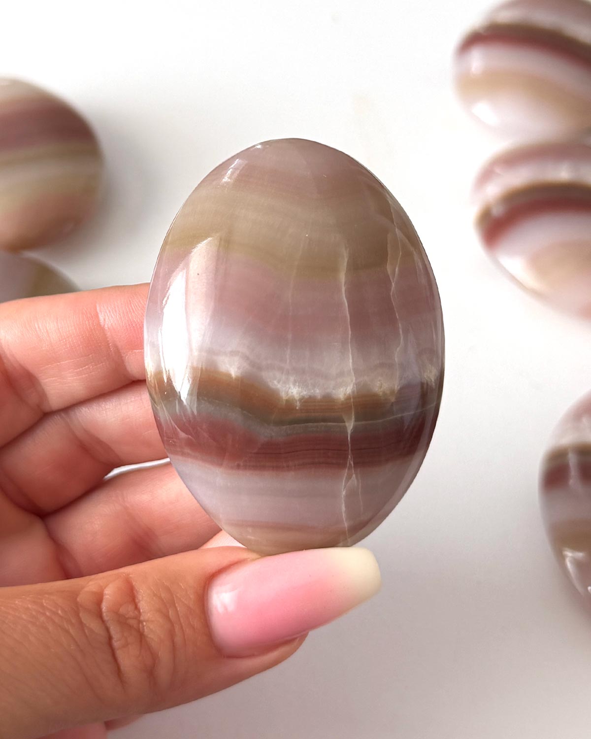 Pink Banded Onyx Palm Stone