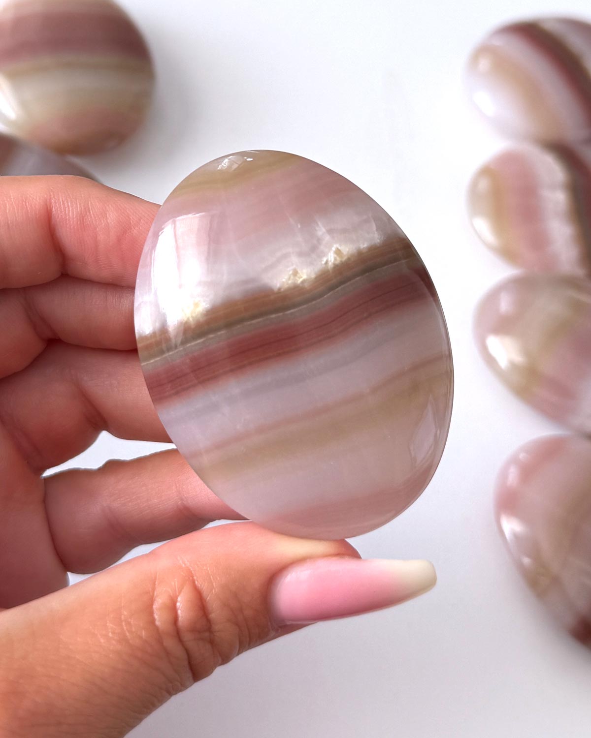 Pink Banded Onyx Palm Stone