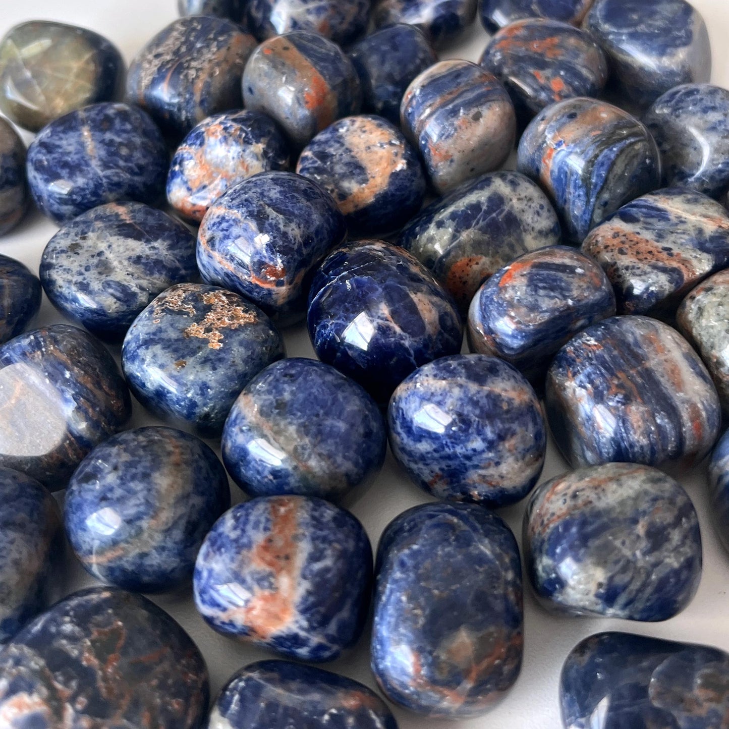 Sunset Sodalite Tumbled Stone