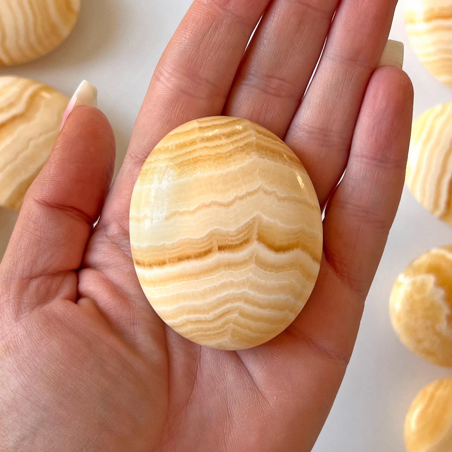 Yellow Banded Calcite Palm Stone