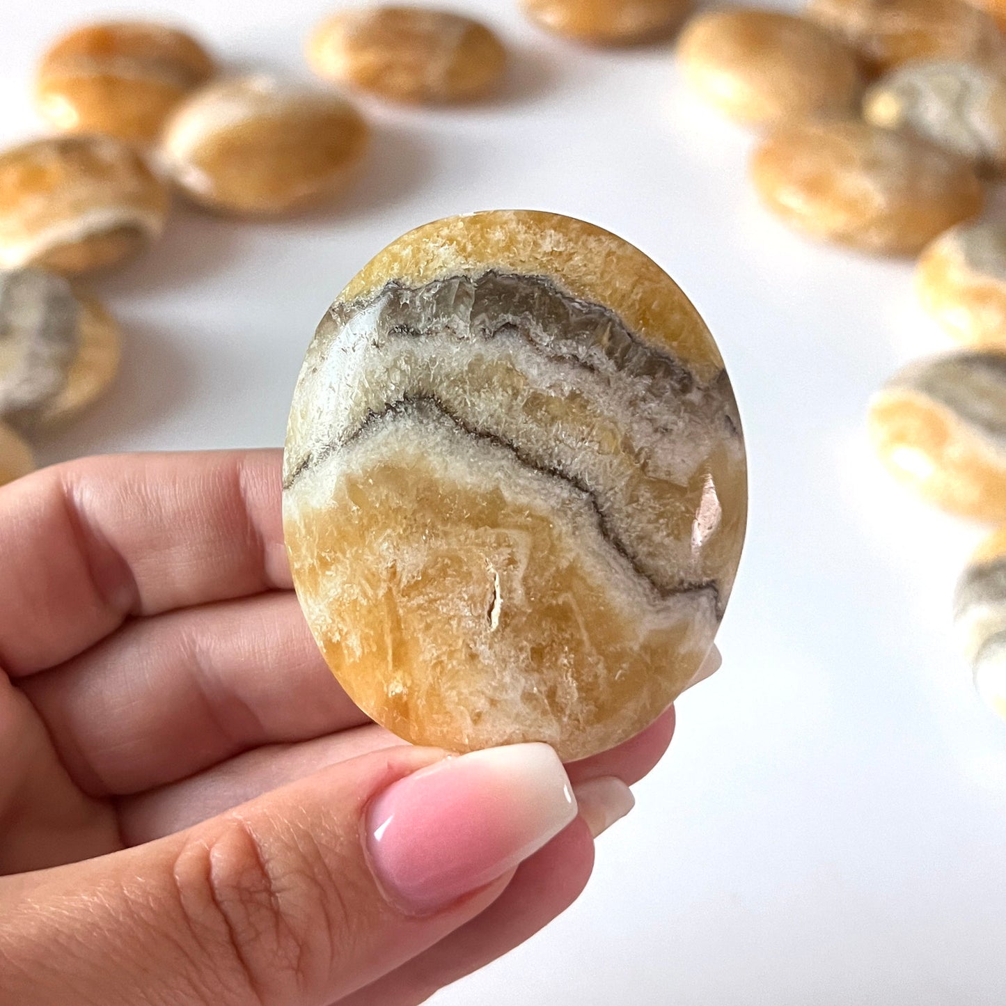 Phantom Zebra Orange Calcite Palm Stone