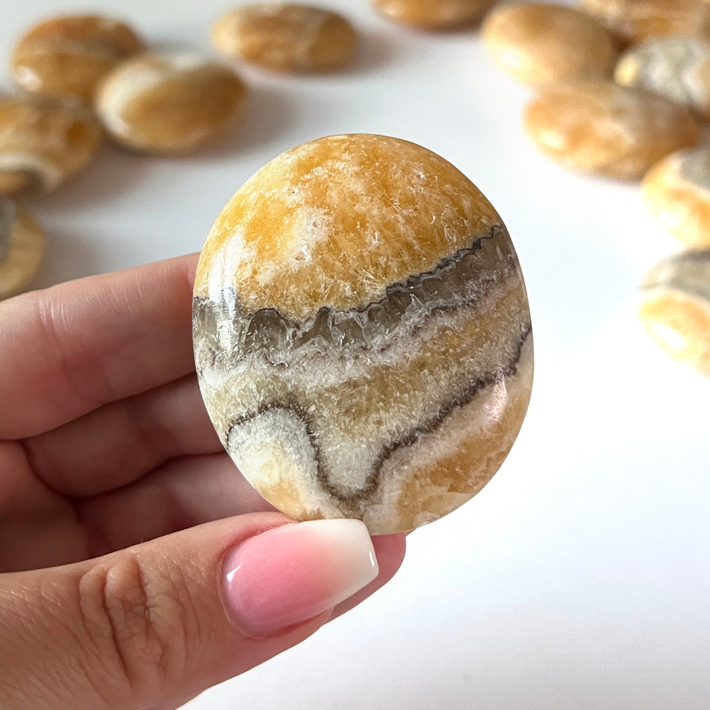 Phantom Zebra Orange Calcite Palm Stone