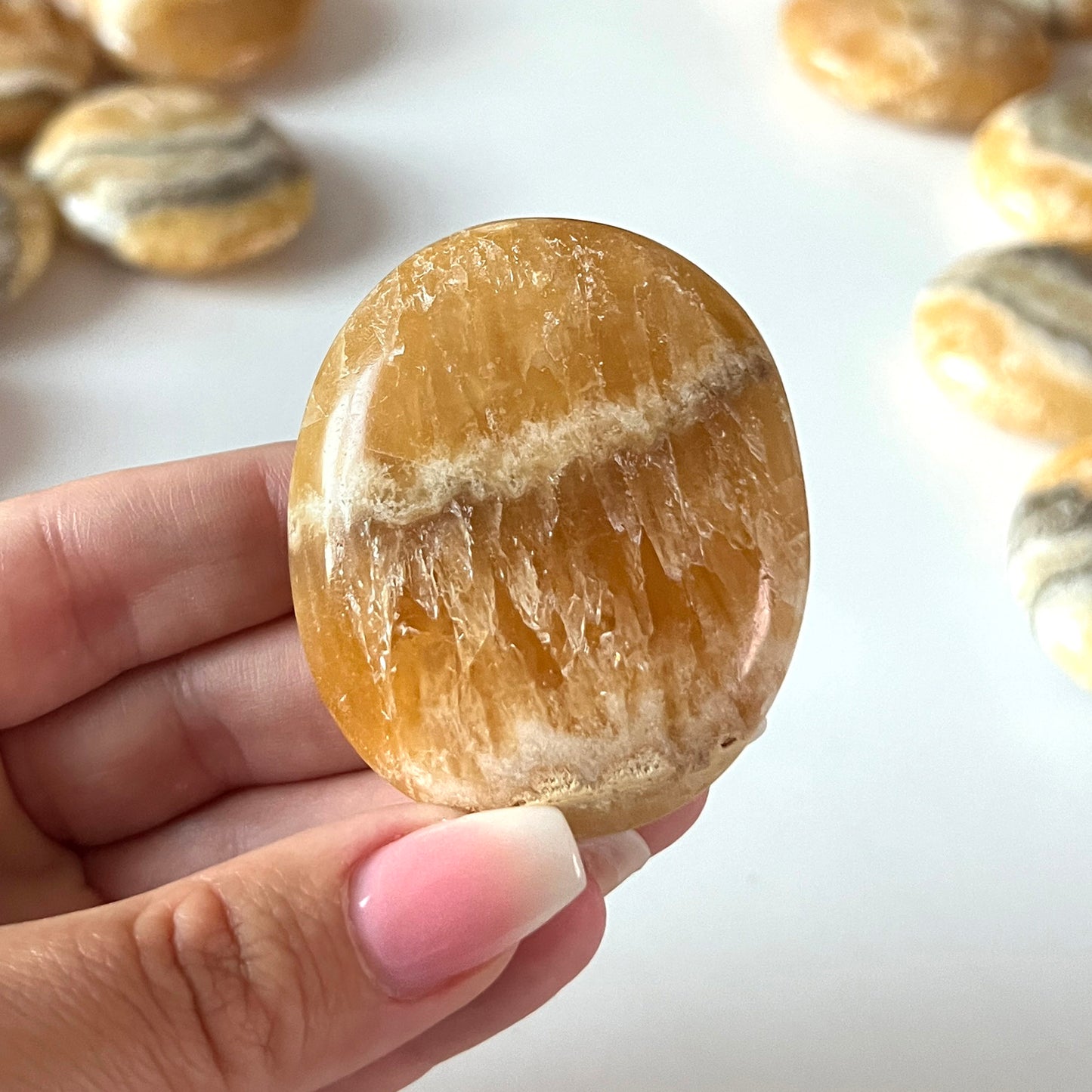 Phantom Zebra Orange Calcite Palm Stone