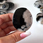 Black Flower Agate Palm Stone