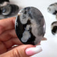 Black Flower Agate Palm Stone