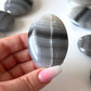 Banded Black Onyx Palm Stone