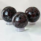 Garnet in Astrophyllite Spheres 60mm