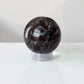 Garnet in Astrophyllite Spheres 60mm