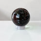 Garnet in Astrophyllite Spheres 60mm
