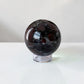 Garnet in Astrophyllite Spheres 60mm