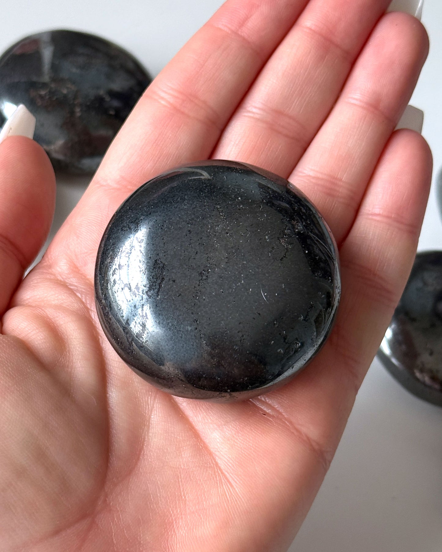 Hematite Round Palm Stone