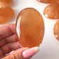 Honey Calcite Palm Stone