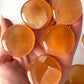 Honey Calcite Round Palm Stone