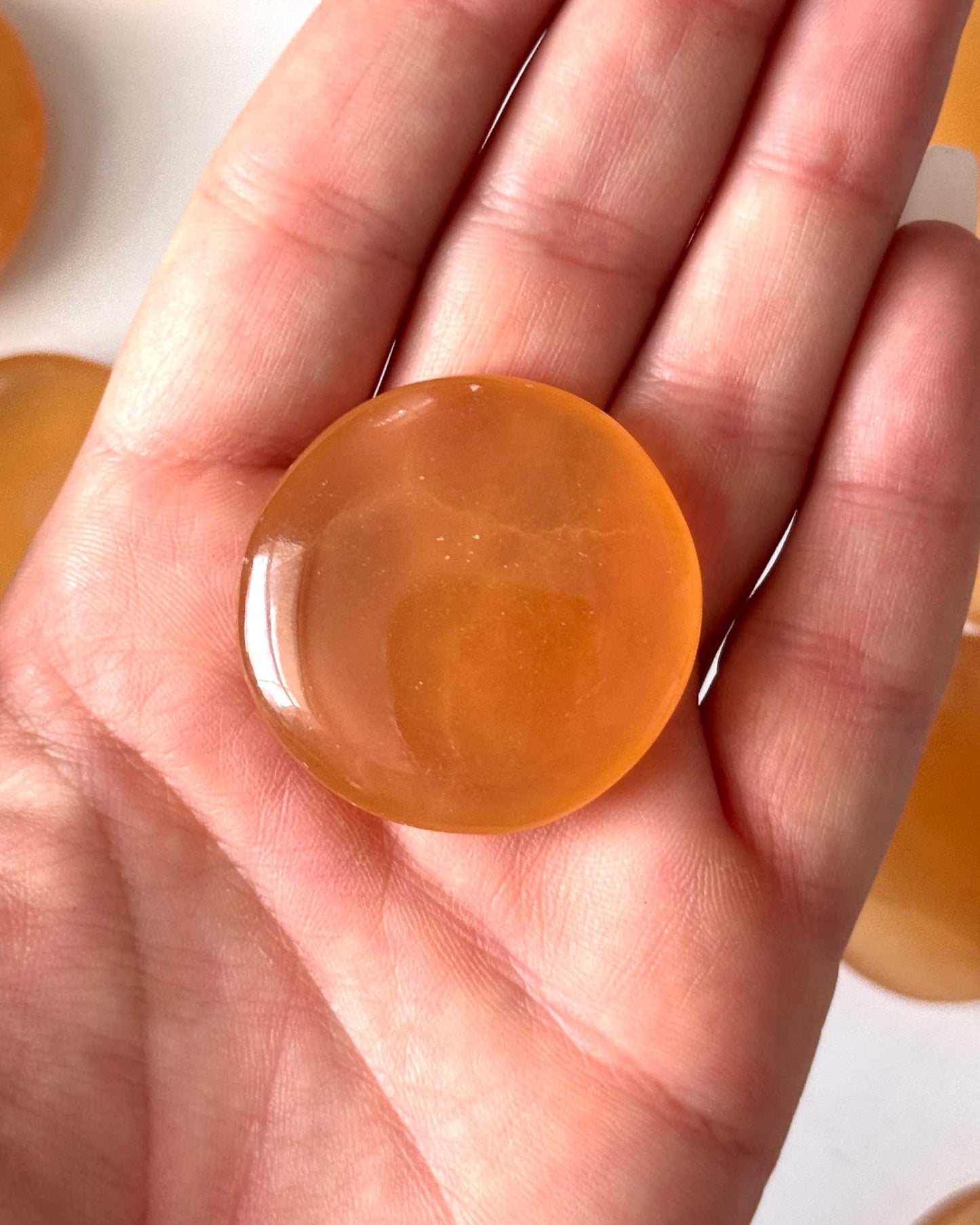 Honey Calcite Round Palm Stone