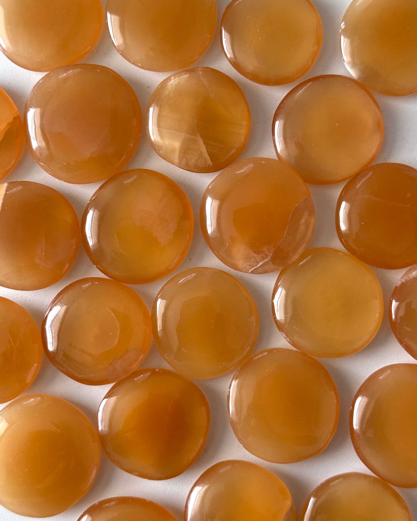 Honey Calcite Round Palm Stone