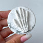 Howlite Skeleton Palm Stone