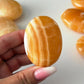 Orange Calcite Palm Stone