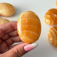 Orange Calcite Palm Stone