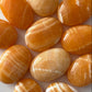 Orange Calcite Palm Stone