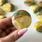 Lemon Calcite Green Onyx Round Palm Stone