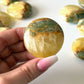 Lemon Calcite Green Onyx Round Palm Stone
