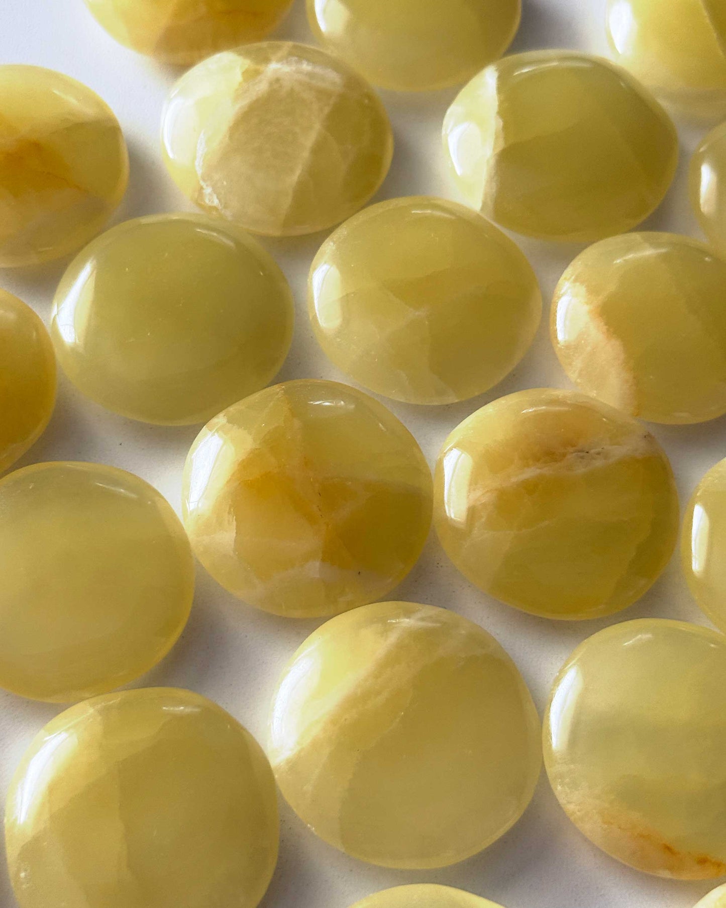 Lemon Calcite Round Palm Stone