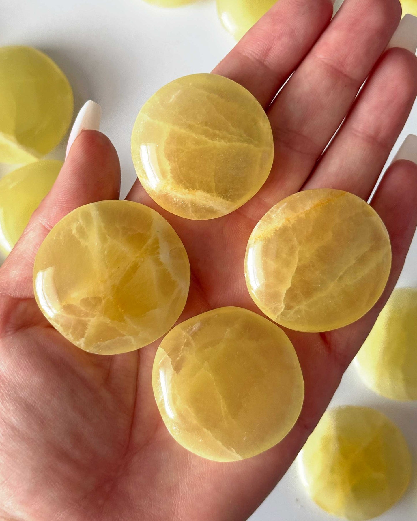 Lemon Calcite Round Palm Stone