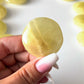 Lemon Calcite Round Palm Stone
