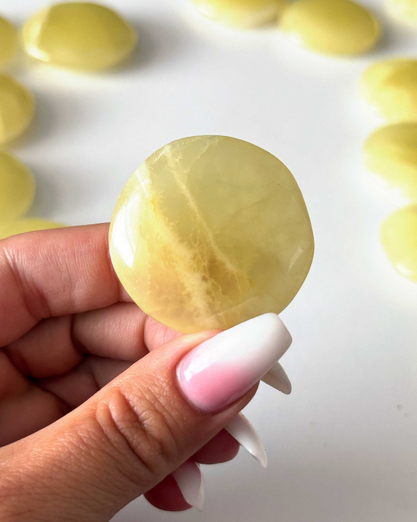 Lemon Calcite Round Palm Stone