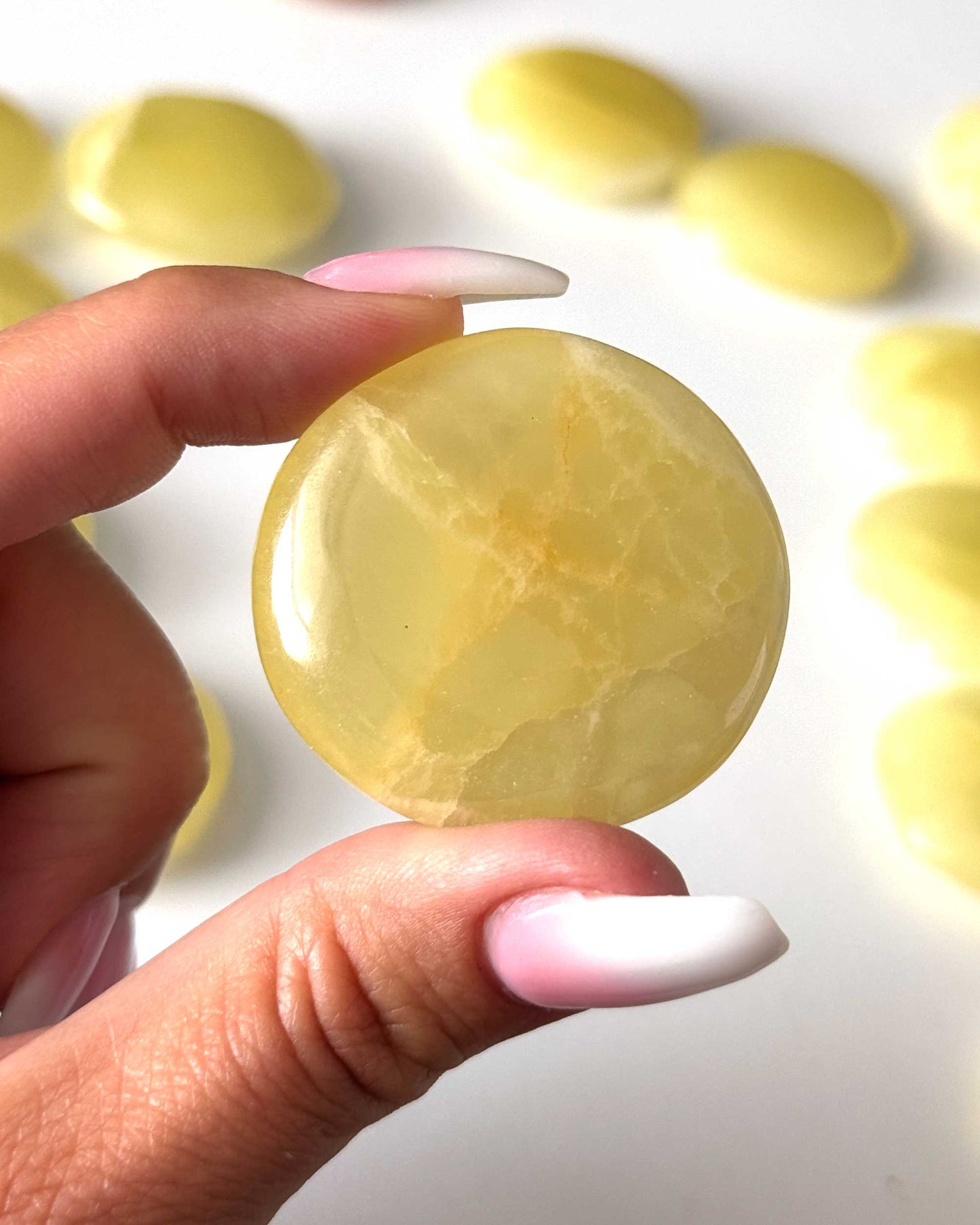 Lemon Calcite Round Palm Stone