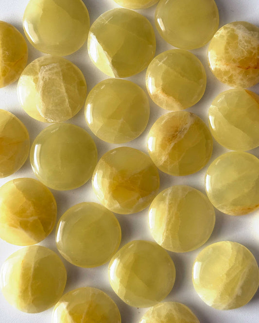 Lemon Calcite Round Palm Stone