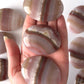 Pink Banded Onyx Palm Stone