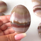 Pink Banded Onyx Palm Stone