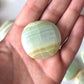 Pistachio Calcite Round Palm Stone