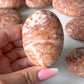 Red Net Jasper Palm Stone