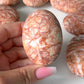 Red Net Jasper Palm Stone