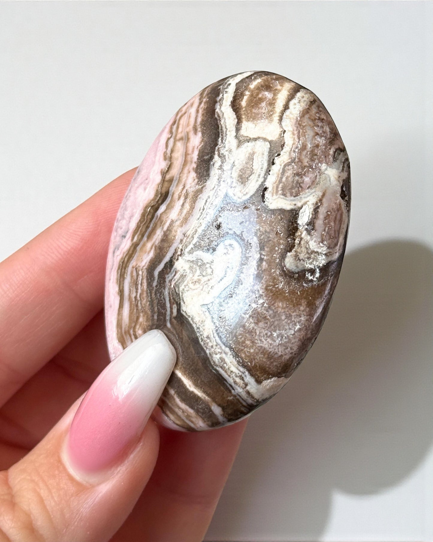 Rhodochrosite Palm Stone