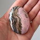 Rhodochrosite Palm Stone