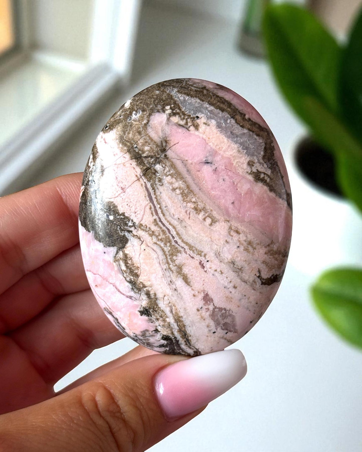 Rhodochrosite with Quartz Palm Stone