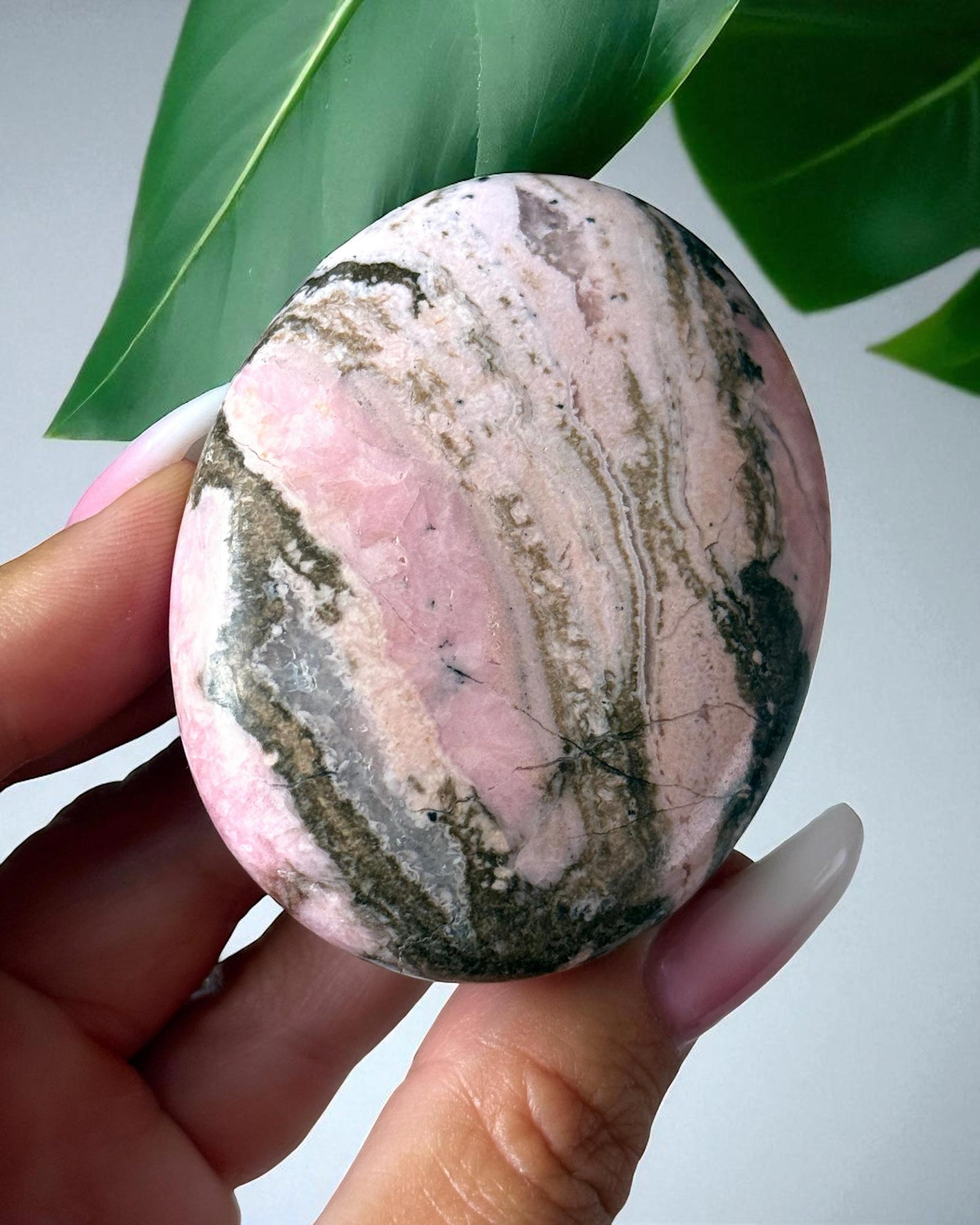 Rhodochrosite with Quartz Palm Stone