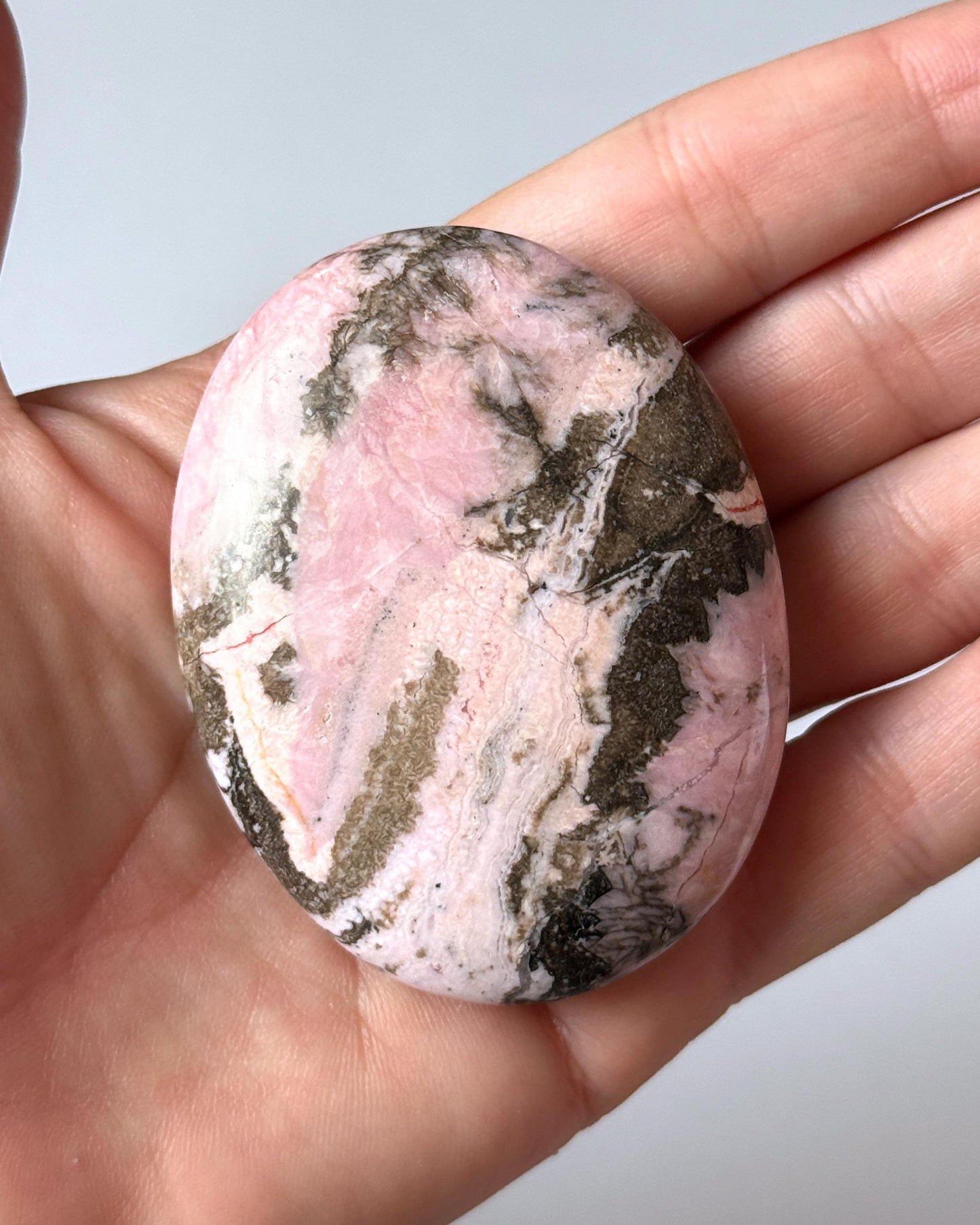Rhodochrosite with Quartz Palm Stone