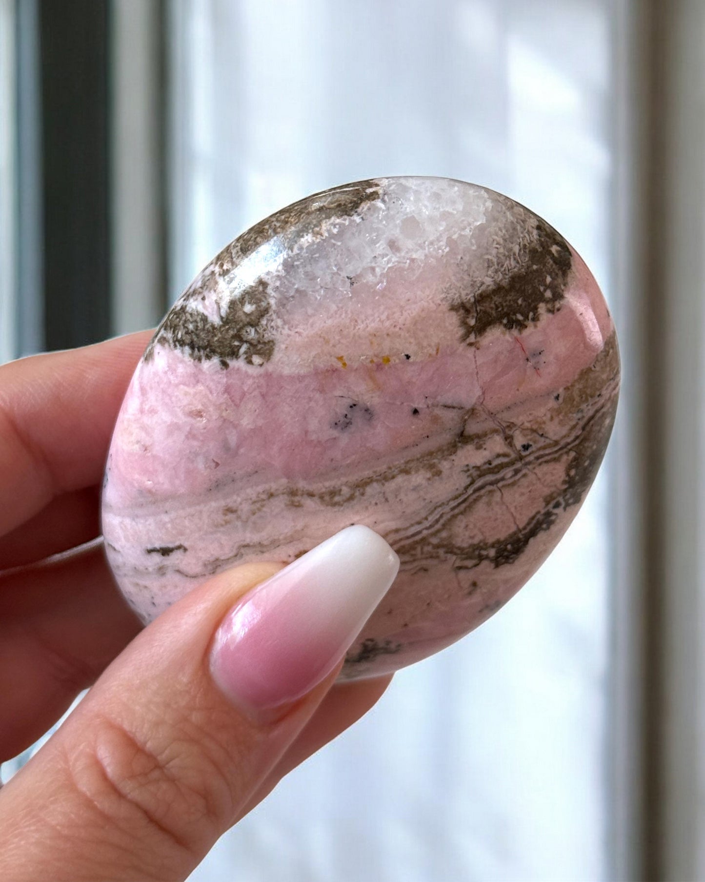 Rhodochrosite with Quartz Palm Stone