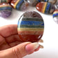 7 Chakra Bonded Palm Stone - Sole Luna